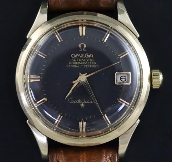 A gentlemans 1960s steel and gold plated Omega Constellation automatic pie pan black dial wrist watch,